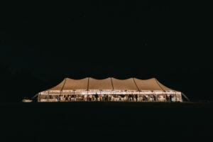 Wedding tent at night in Alnoba field