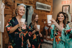 Bridesmaids in cabin celebrating